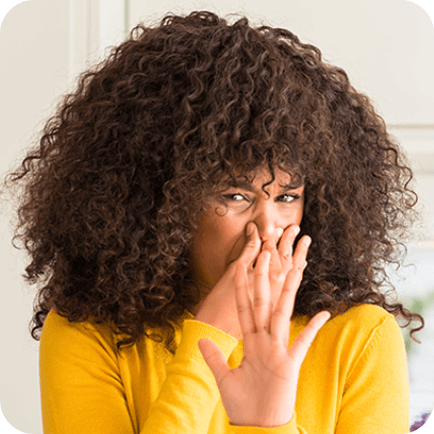 Woman covering her nose
